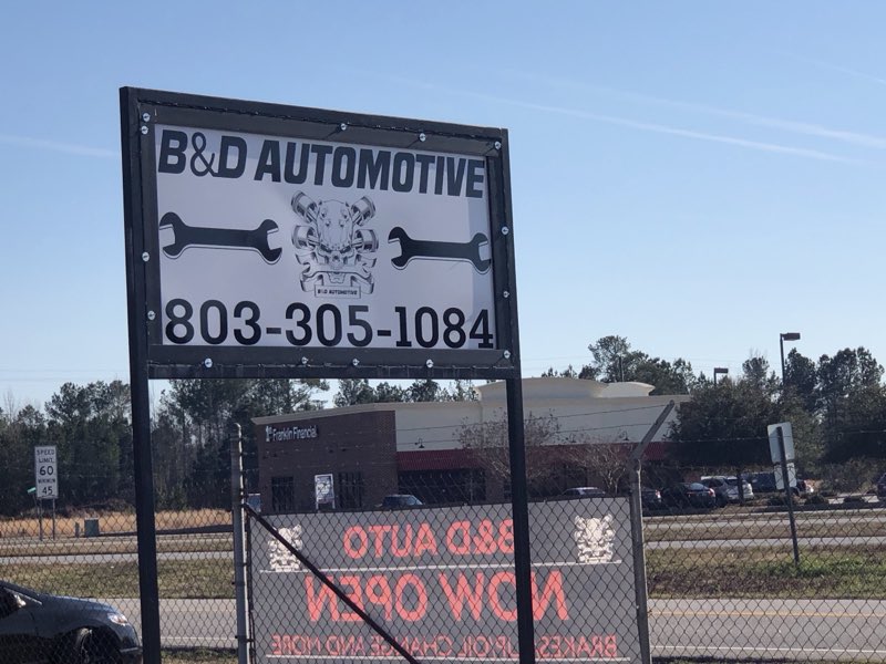 B&D Automotive road sign